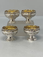 Load image into Gallery viewer, Superb Set of Four Antique Sterling Silver Embossed Salts with original gilt interiors and excellent condition
