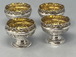 Load image into Gallery viewer, Superb Set of Four Antique Sterling Silver Embossed Salts with original gilt interiors and excellent condition
