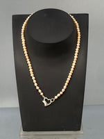 Load image into Gallery viewer, Pink Pearl Necklace with a Silver Heart Clasp

