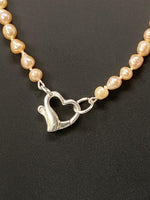 Load image into Gallery viewer, Pink Pearl Necklace with a Silver Heart Clasp
