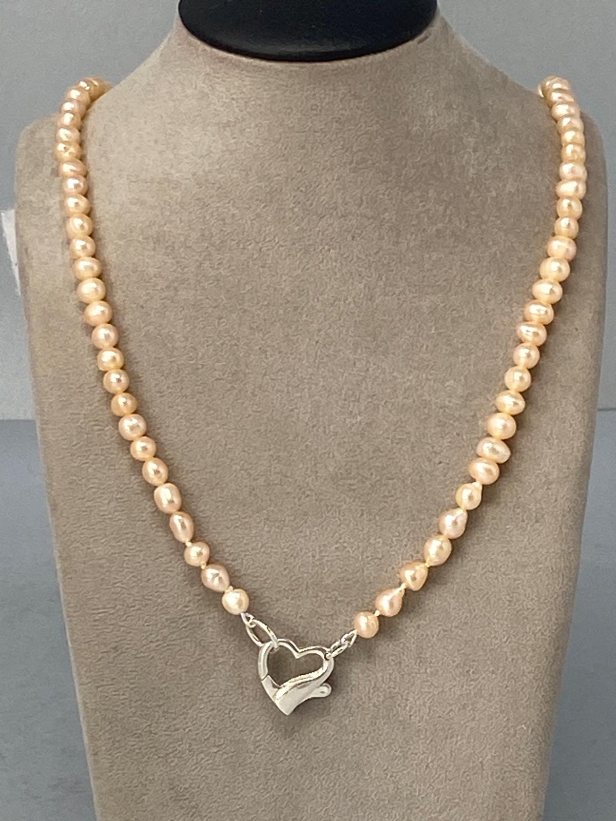 Pink Pearl Necklace with a Silver Heart Clasp