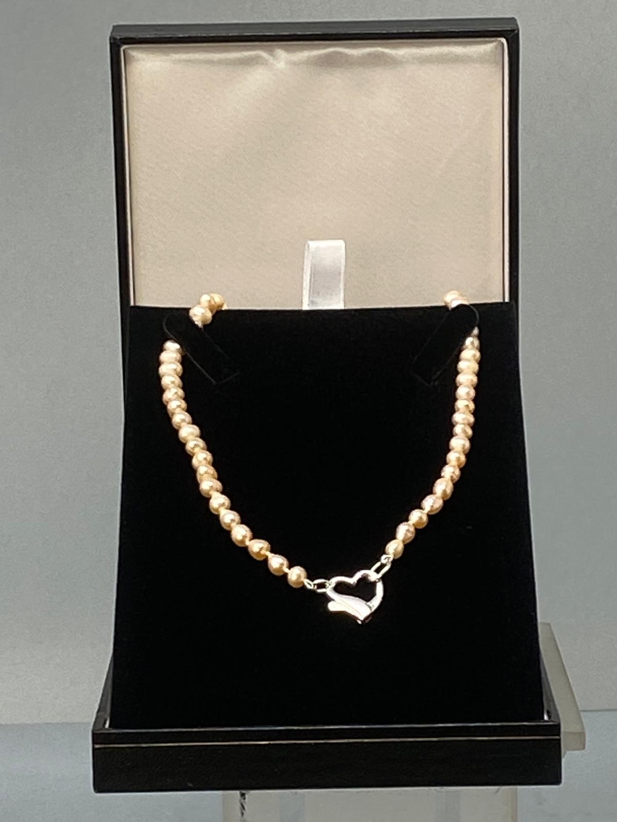 Pink Pearl Necklace with a Silver Heart Clasp