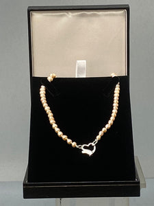 Pink Pearl Necklace with a Silver Heart Clasp