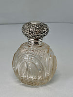Load image into Gallery viewer, Antique Victorian Chased Top Steling Silver &amp; Cut Glass Perfume Bottle
