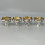 Load image into Gallery viewer, Superb Set of Four Antique Sterling Silver Embossed Salts with original gilt interiors and excellent condition
