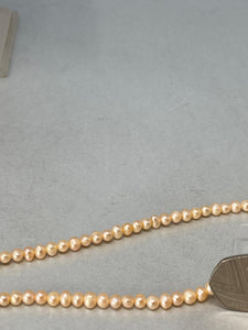 Pink Pearl Necklace with a Silver Heart Clasp
