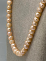 Load image into Gallery viewer, Pink Pearl Necklace with a Silver Heart Clasp
