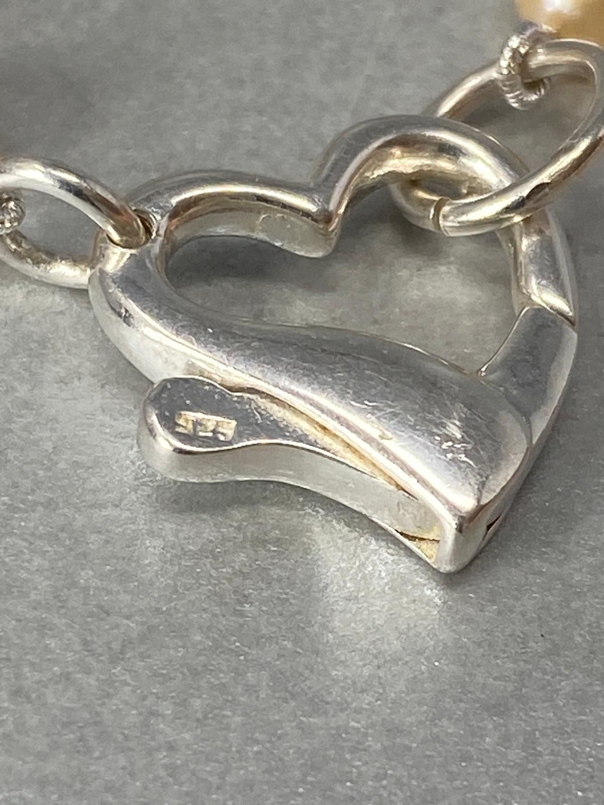 Pink Pearl Necklace with a Silver Heart Clasp
