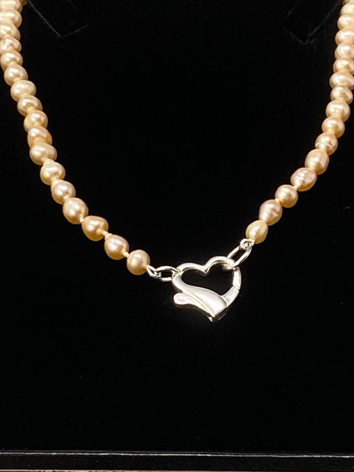 Pink Pearl Necklace with a Silver Heart Clasp