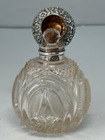 Load image into Gallery viewer, Antique Victorian Chased Top Steling Silver &amp; Cut Glass Perfume Bottle
