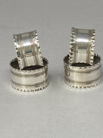 Load image into Gallery viewer, Set of Four Antique Silver Plated Napkin Rings
