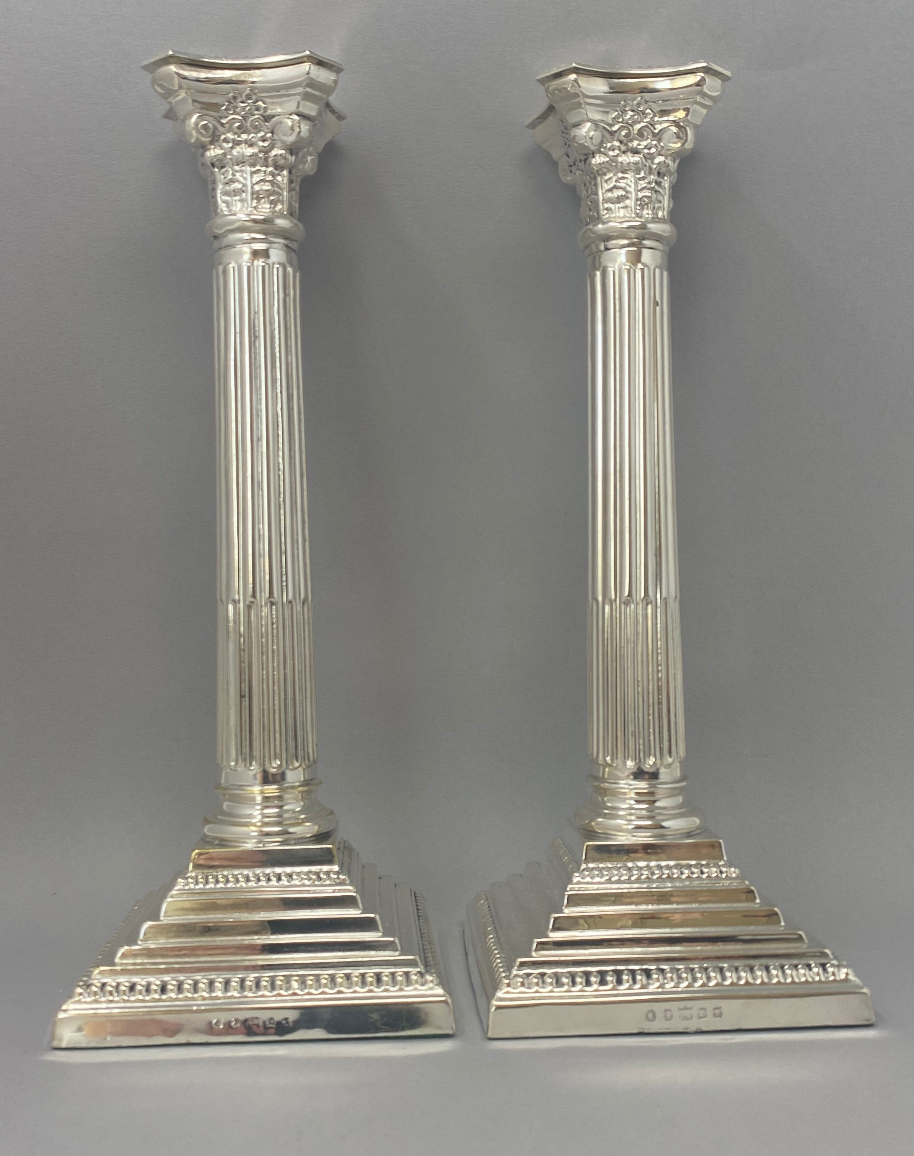 Pair of Antique Silver Plated Corinthian Column Candlesticks