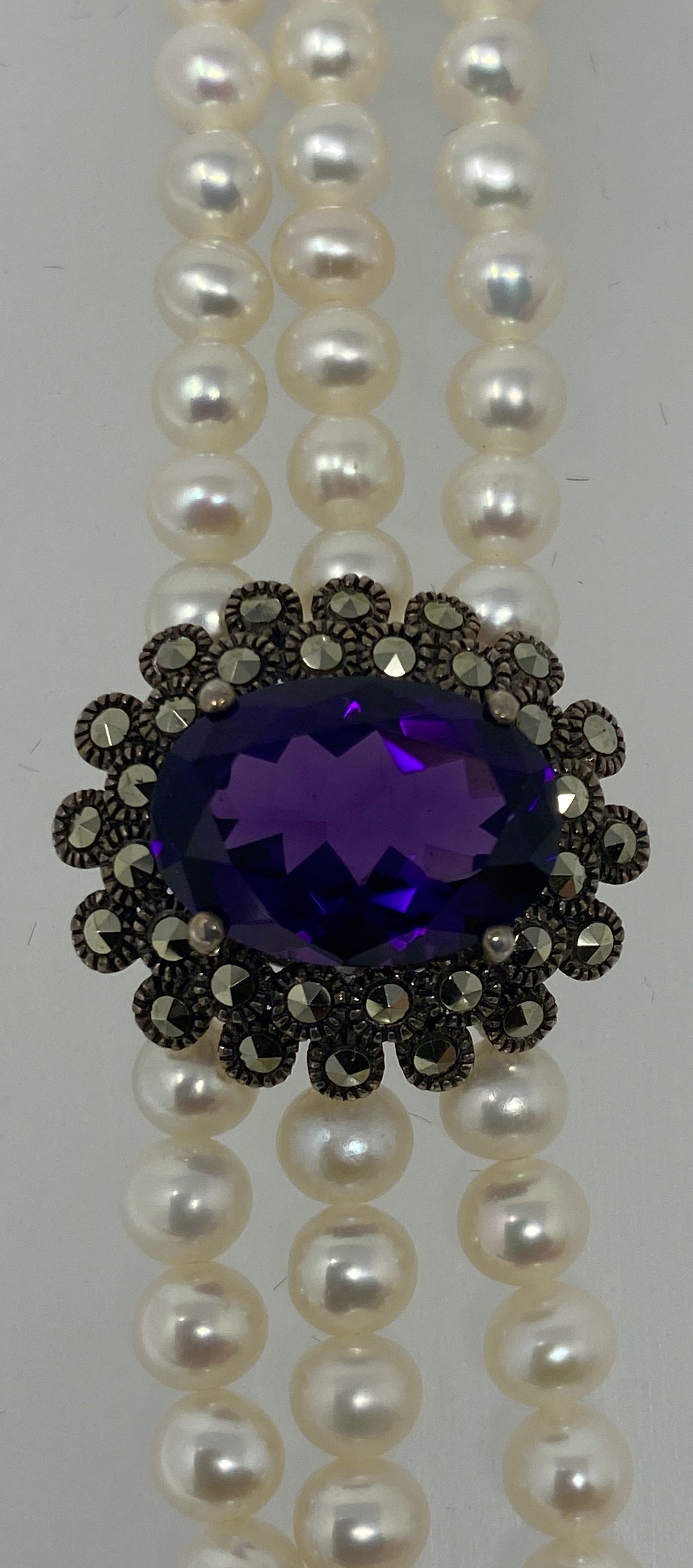 Three Row Pearl Bracelet with Amethyst Centre Stone