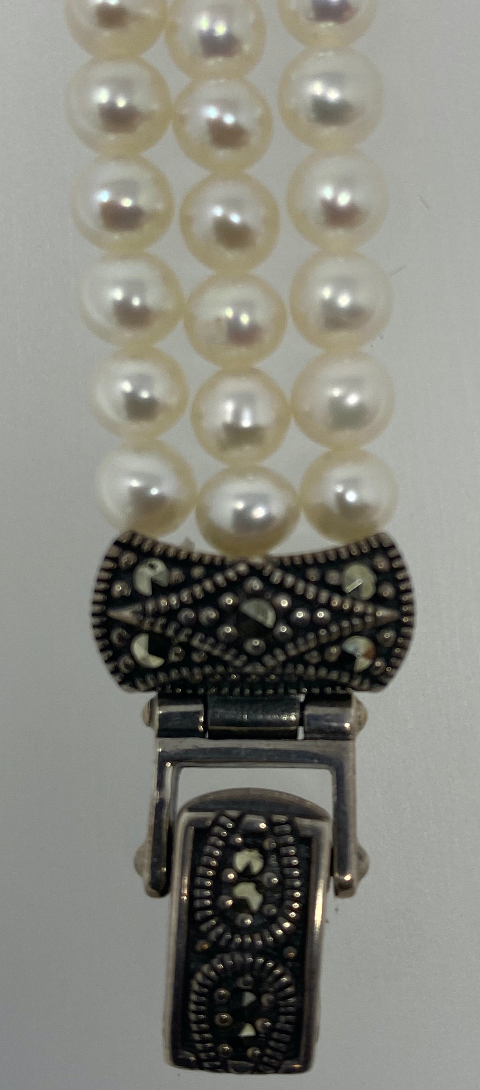 Three Row Pearl Bracelet with Amethyst Centre Stone