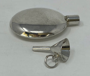 Silver Perfume Bottle and Funnel
