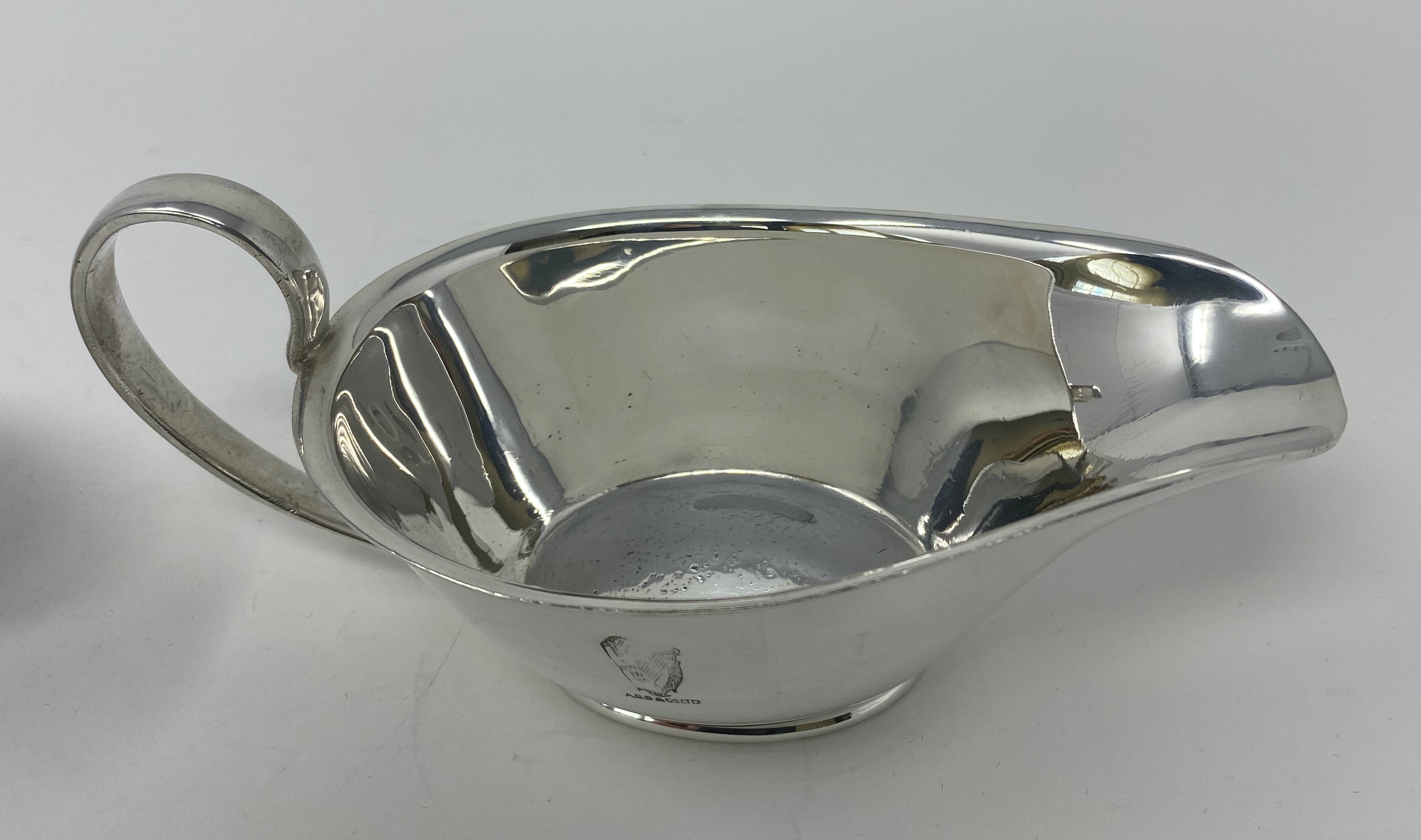 Pair of Silver Plated Sauce Boats with Guiness Crest (worn)