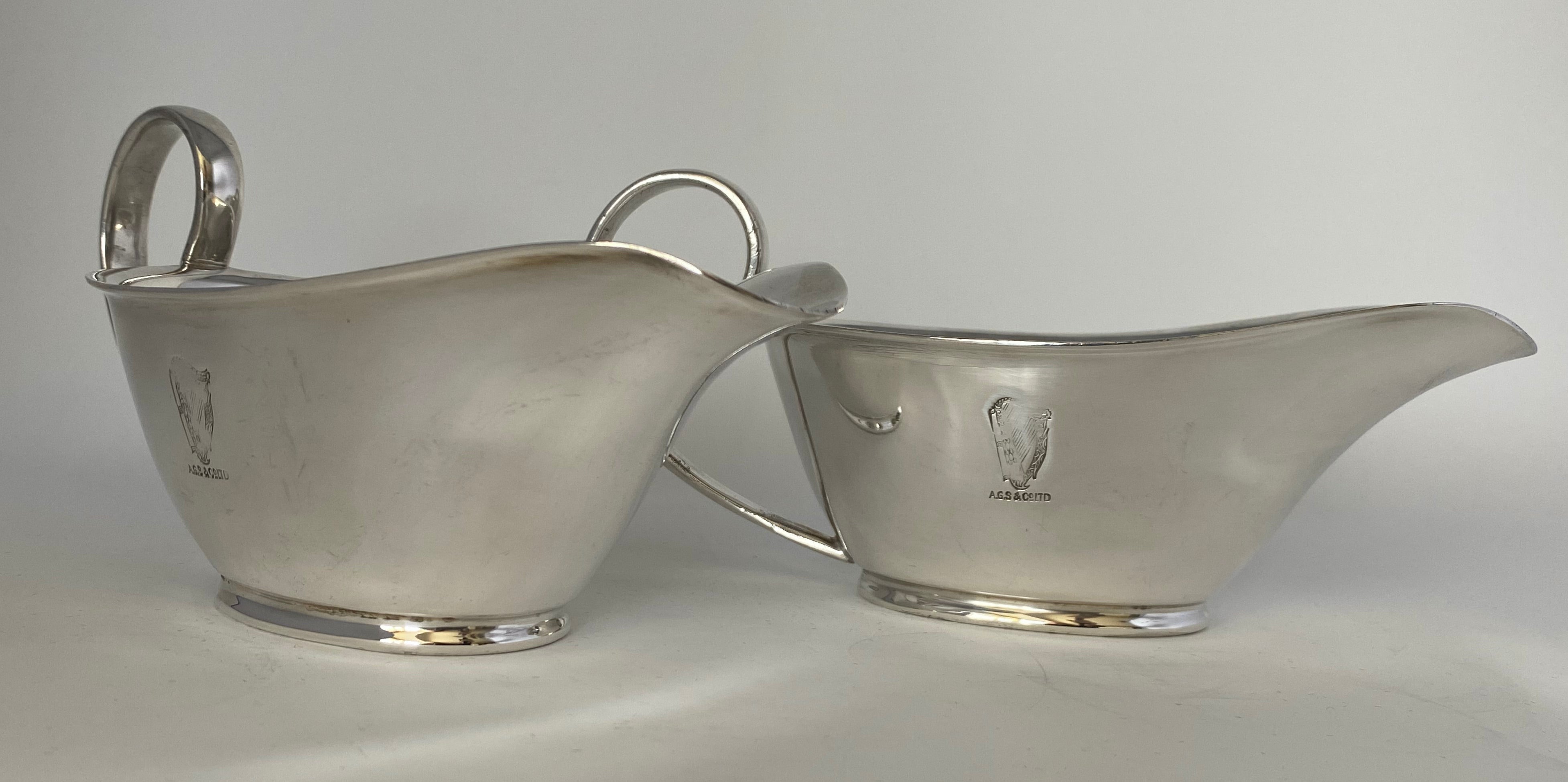 Pair of Silver Plated Sauce Boats with Guiness Crest (worn)