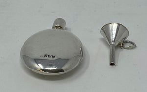 Silver Perfume Bottle and Funnel