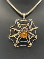 Load image into Gallery viewer, Silver and Amber Spider and Web Necklace
