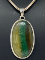 Load image into Gallery viewer, Rainbowlite Pendant on Silver Chain
