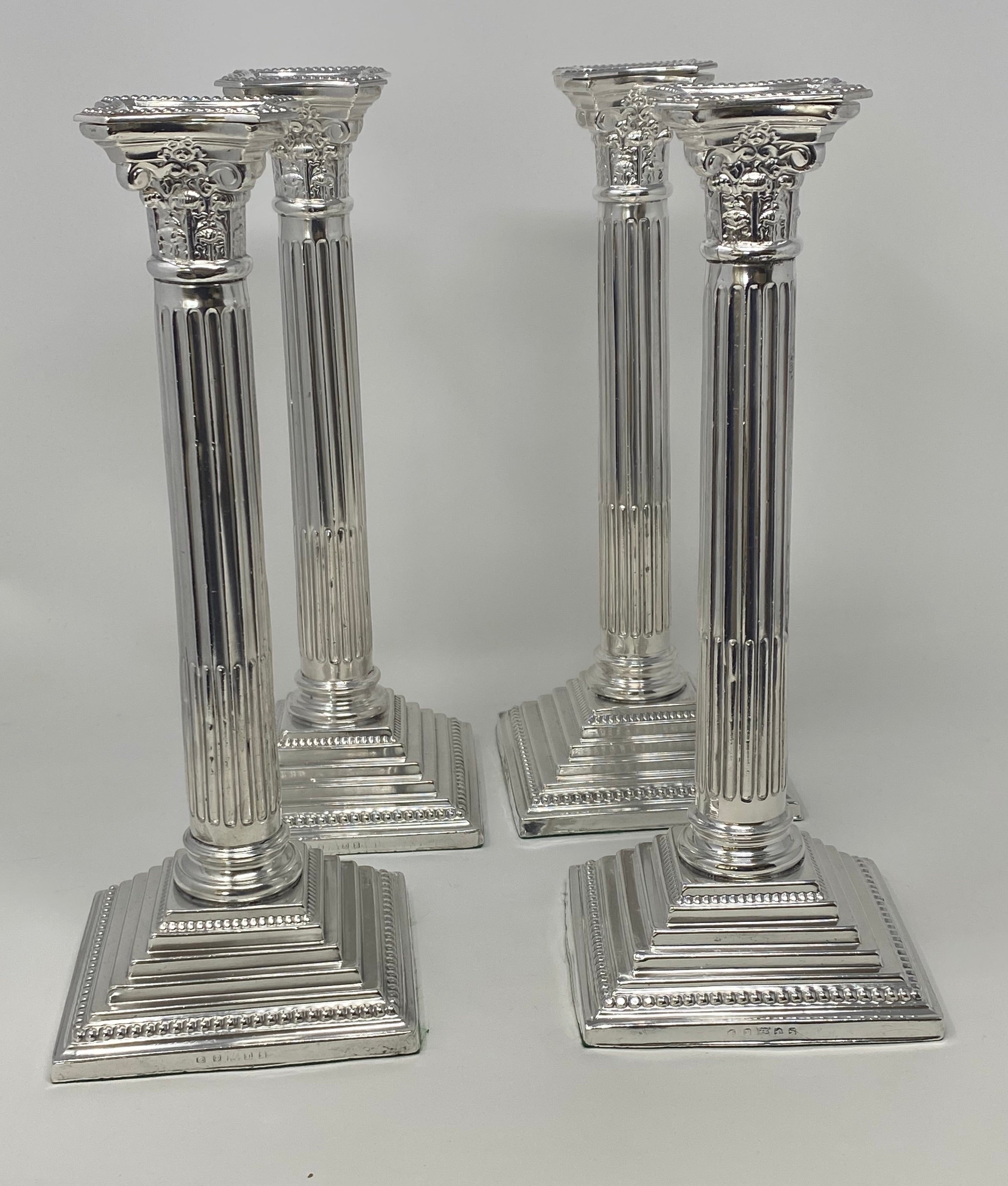 Set of 4 Silver Plated Corinthian Column Candlesticks