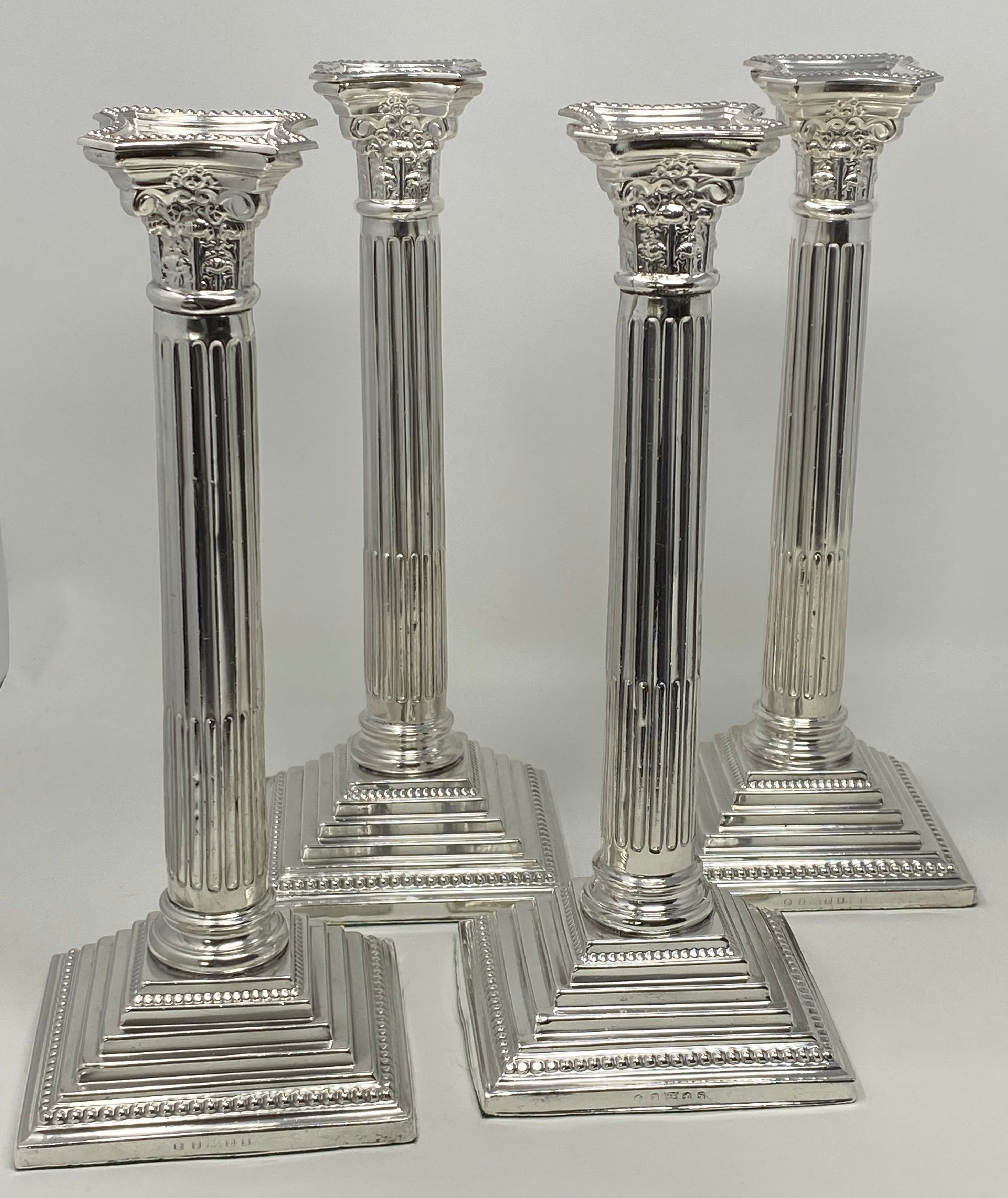 Set of 4 Silver Plated Corinthian Column Candlesticks